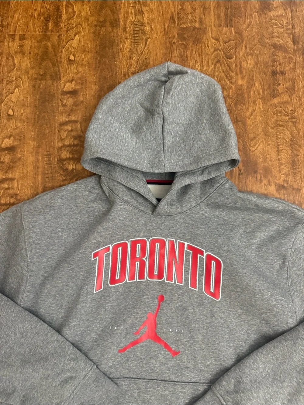 Jordan Toronto Grey Pullover Hoodie with Red Logo